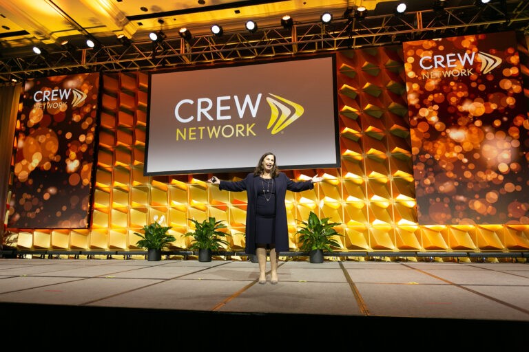 CREW Network individual female speaker on stage